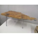 An elm and resin infilled occasional table, on metal pin legs, 15" h x 34 1/2"w