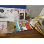 A quantity of 1980s 12" records to include Stevie Wonder and Bananarama, together with 1950s and