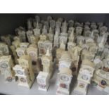 A large selection of crested china, mainly all in the form of long case clocks