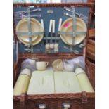 A vintage Sirram picnic set with contents