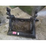 A Victorian cast iron boot scraper