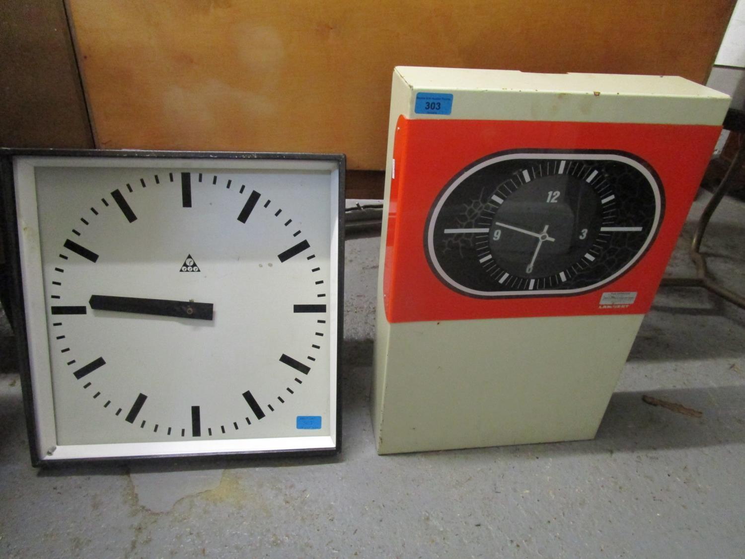 A Lambert metal cased retro clocking in clock and a wall clock