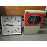 A Lambert metal cased retro clocking in clock and a wall clock