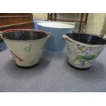 Three painted vintage buckets, one originally a fire bucket