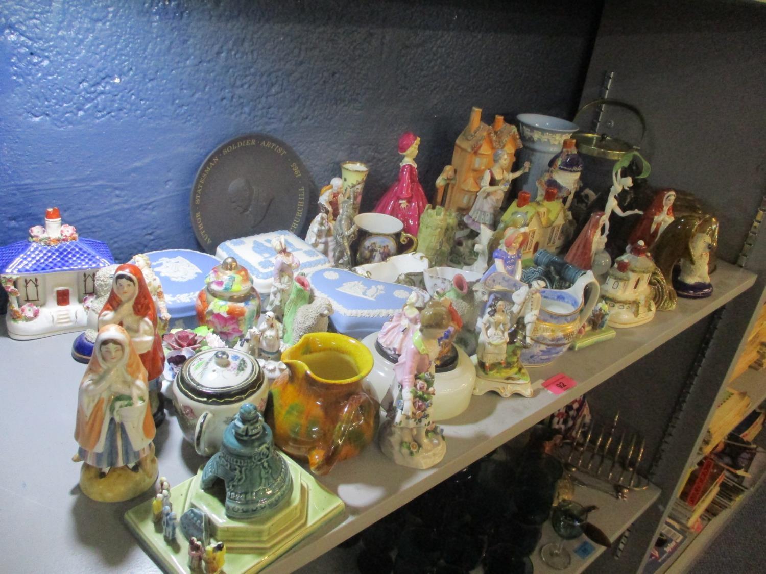 A mixed lot to include a Sitzendorf figure, Staffordshire ornaments, jelly mould, Wedgwood