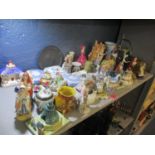 A mixed lot to include a Sitzendorf figure, Staffordshire ornaments, jelly mould, Wedgwood