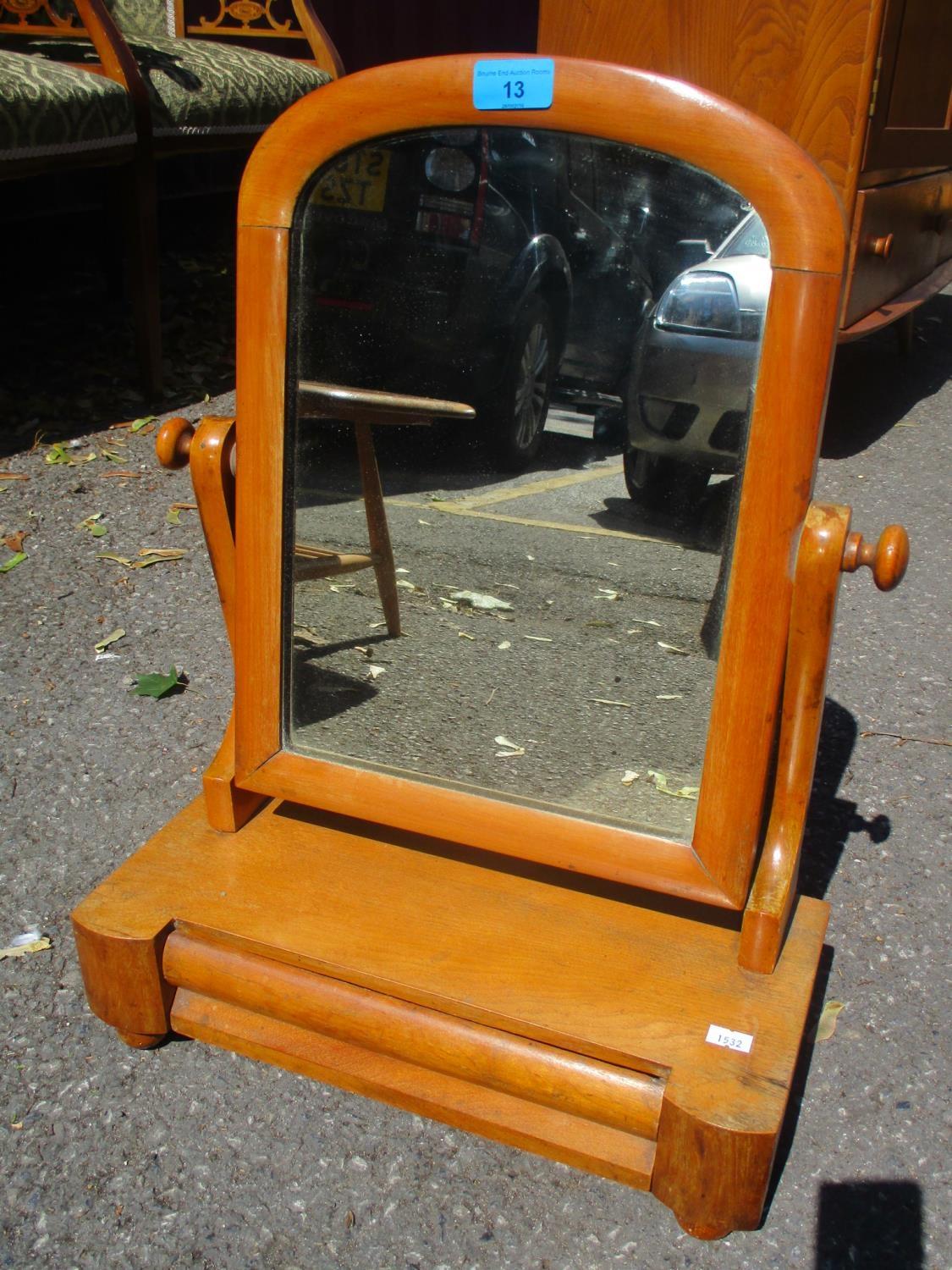 A Victorian satinwood dressing table swing mirror having cushion moulded drawer 22"h x 15 1/2"w