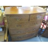 A late 19th/early 20th century mahogany bow fronted chest of two short and three long drawers,