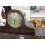 A 1930s/1940s mahogany cased mantel clock with key