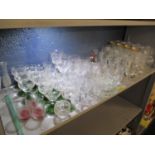 A selection of glassware to include Doulton cut glasses, wine glasses with gilded tops and others