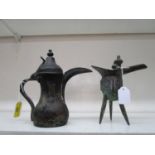 A Chinese bronze patinated metal pouring vessel in the form of an archaic bronze vessel and a Middle