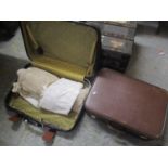 Two suitcases, one an Antler case containing mixed linen