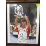 A signed Martin Johnson photograph, 19 1/2" x 13 1/2", framed and glazed