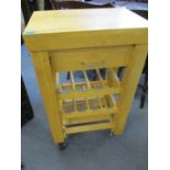 A modern pine butchers block style trolley