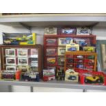 Three large boxed collectors car models, together with mixed boxed and loose model cars contained in