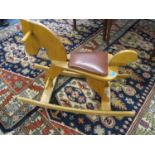 A Moulin Roty retro style rocking horse, 23" x 29" x 14"