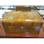 A Victorian rosewood writing slope inset with mother of pearl