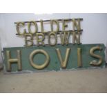 A late 19th/early 20th century gold and green painted metal Hovis Golden Brown bread sign in three