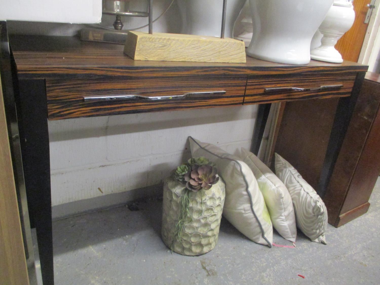 A modern exotic wood veneered, two drawer side table on tapering black legs, 30 1/2" x 48"