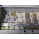 A cash box with key containing mixed British coins from Queen Victoria to QE2