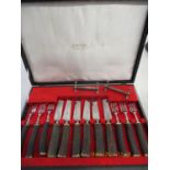 A vintage K Bright Ltd Horn handled style steak knives and forks, together with two silver plated