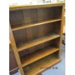 A mid 20th century oak bookcase with three removable shelves