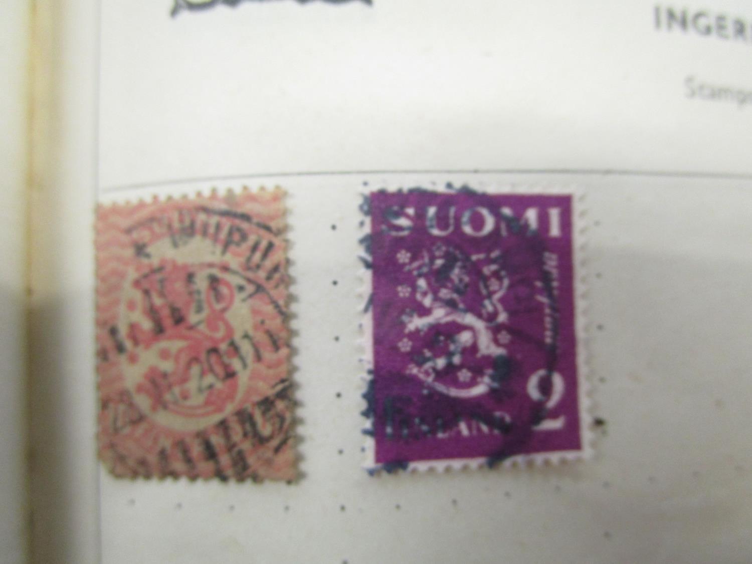 An early 20th century stamp album containing Victorian and early 20th century stamps from around the - Image 3 of 12