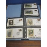 Seventy one Benham first day covers in two albums