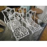 A set of four aluminium white painted garden chairs