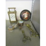 A mixed lot to include a brass cased five window carriage clock, two brass candle snuffers,