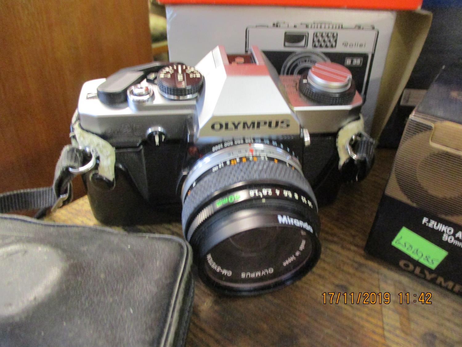 Vintage cameras, mostly late 20th century to include an Olympus OM20, a Nikon TW2, together with a - Image 2 of 3