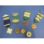 A small quantity of driving badges and medals with ribbons, circa 1960
