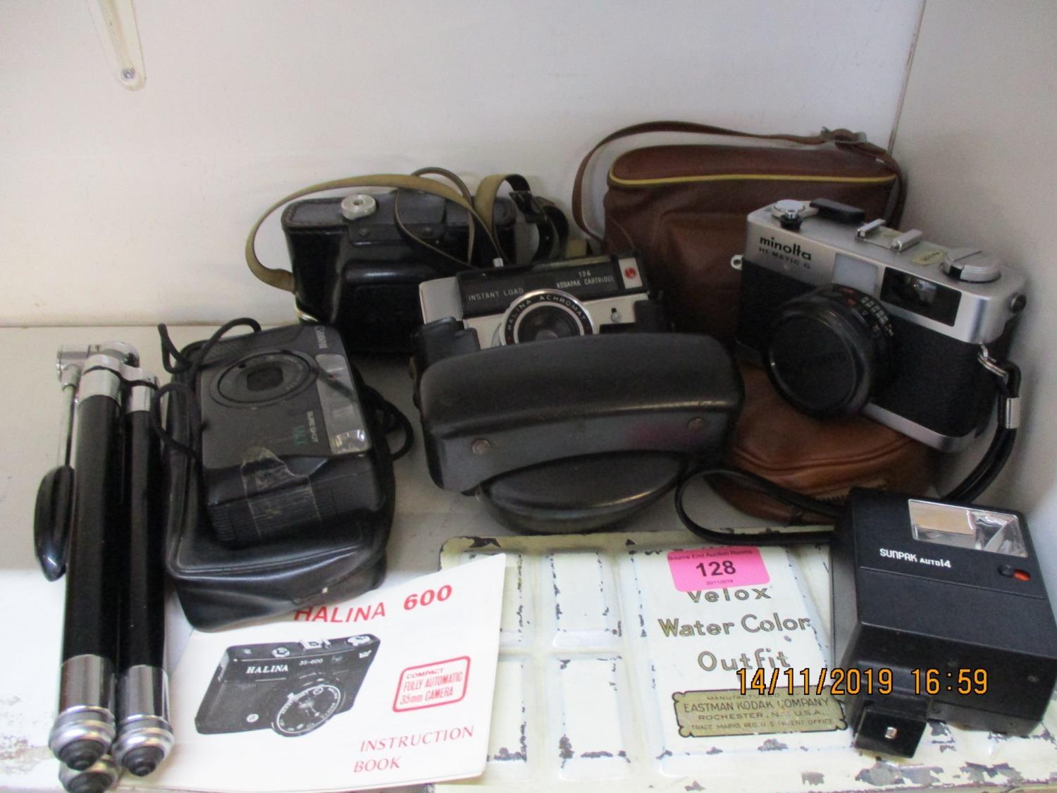 Vintage cameras to include an instant load Kodak, a Minolta Hi-Matic, together with a tripod and a