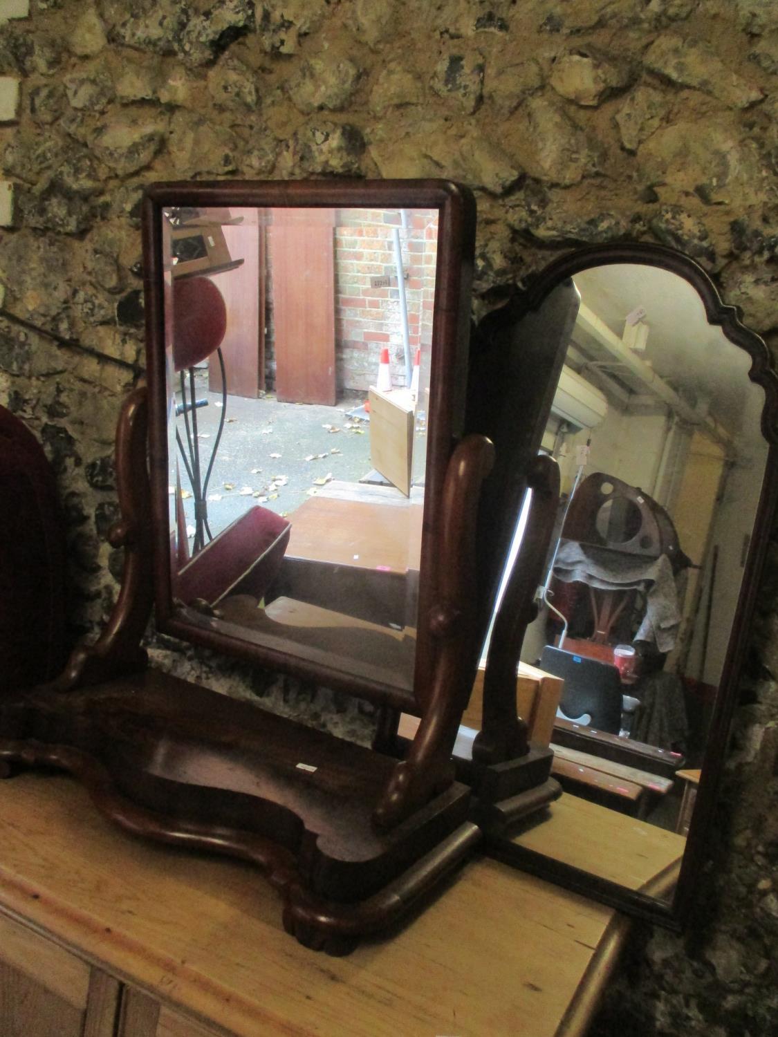 Two mirrors to include a 19th century flame mahogany dressing table swing mirror, 29" h x 23 1/2"w