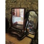 Two mirrors to include a 19th century flame mahogany dressing table swing mirror, 29" h x 23 1/2"w