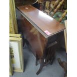 An Edwardian mahogany Sutherland table