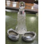 A cut glass silver topped scent bottle, together with two silver salts