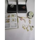 A small quantity of jewellery to include 14ct gold earrings A/F and a white gold and garnet ring