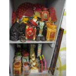 A quantity of far Eastern export items to include composition Buddhas, papermache storage