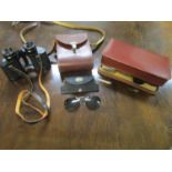 Carl Zeiss Jenoptem leather and cased binoculars 8 x 30w, a cased vanity set and shade for glasses