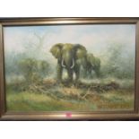 J Carley - Elephants, an oil on board, signed lower right hand corner in late 20th century painted