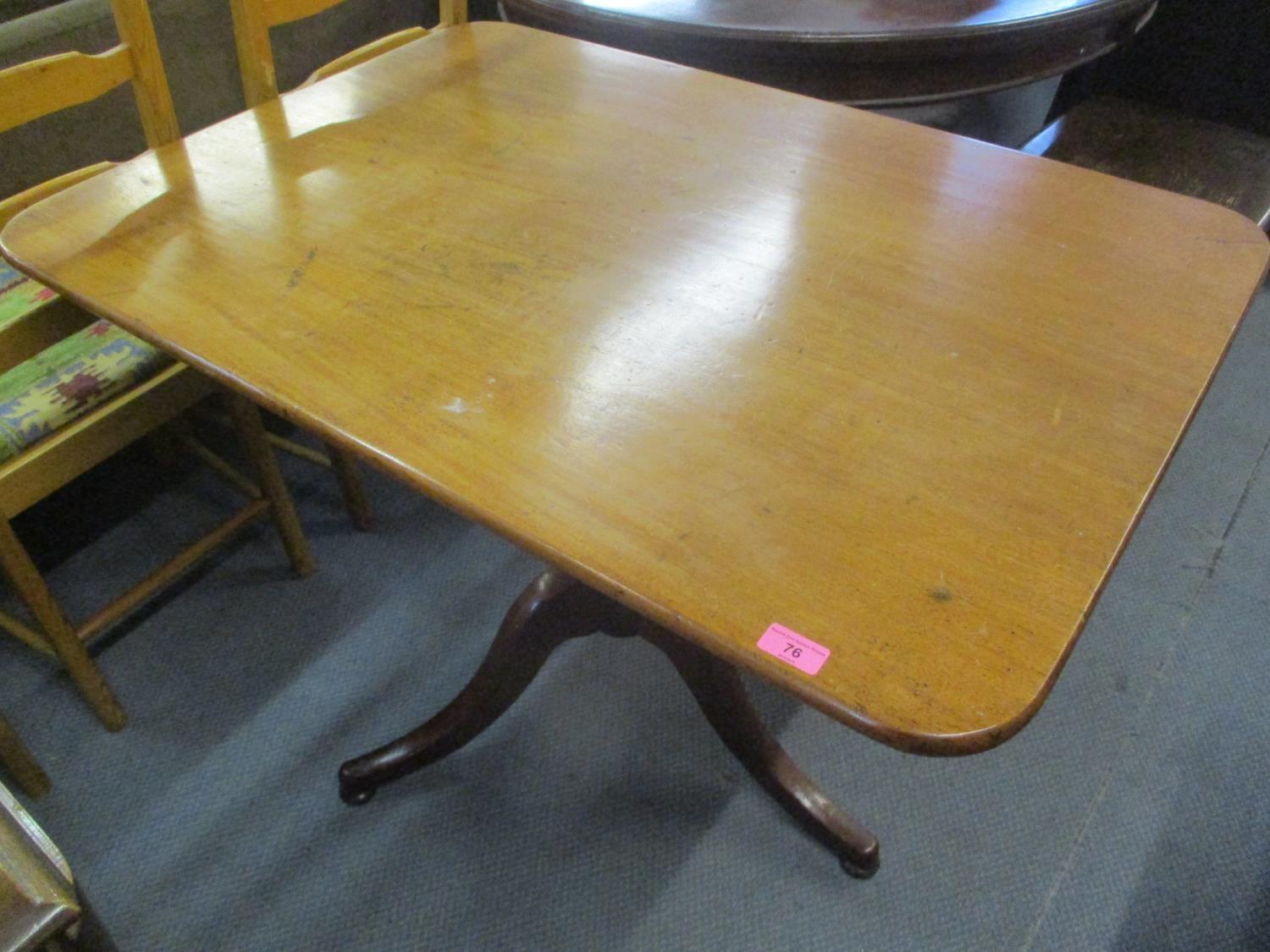A Victorian mahogany occasional table having a turned column and three splayed legs, 29 1/4"h x 39