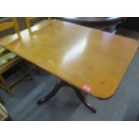 A Victorian mahogany occasional table having a turned column and three splayed legs, 29 1/4"h x 39