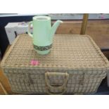 A wicker basket containing a Carlton ware coffee service