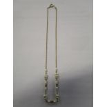 A 9ct gold and natural pearl necklace