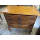 A reproduction French oak small chest of three long drawers on cabriole legs, 30"h x 28 3/4"w
