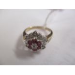 A 9ct yellow and white gold ruby and diamond ring, 3.25g