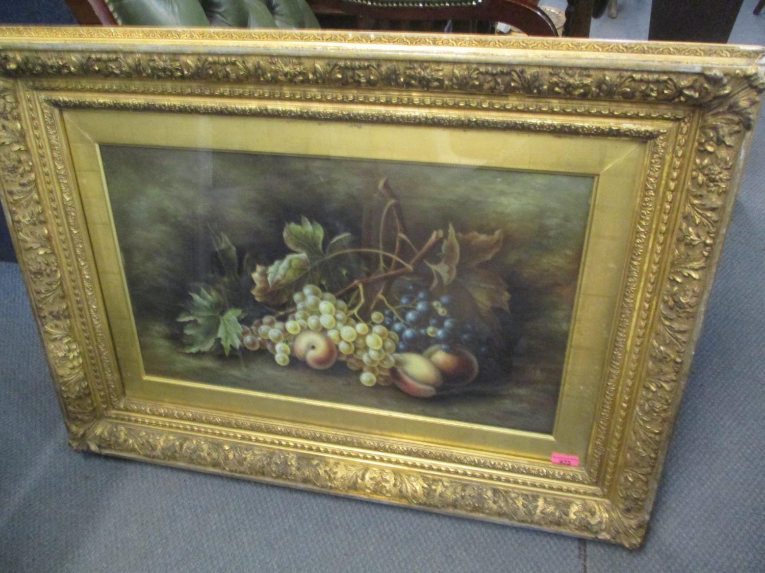 A I - a still life of fruit oil on canvas, in a glazed gilt frame