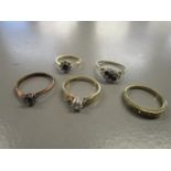 Two 9ct gold rings, one set with diamonds, the other with a central sapphire surrounded by