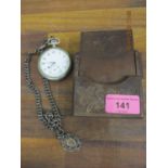 A nickel plated pocket watch with chain and carved treen watch case